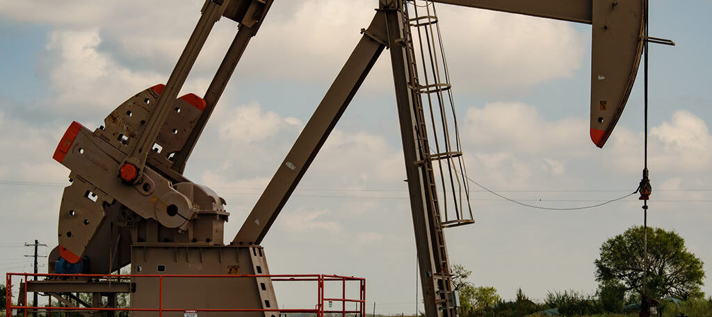 An oil well is designed to access and extract oil from underground reservoirs.